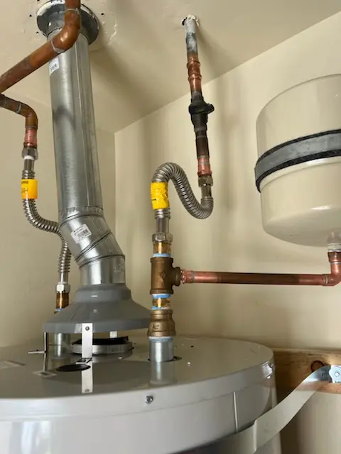 Water heater installation and plumbing repair in Carroll Manor